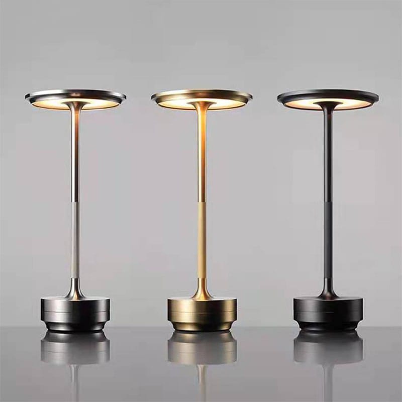 Rechargeable cordless table lamp showing gold, silver and black colors